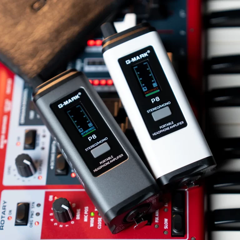 Two G-MARK P8 portable headphone amplifiers mounted in an audio rack with red control panels nearby. ขายราคาพิเศษ