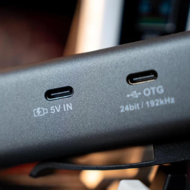 USB-C 5V input and OTG port on a dark device panel; labels read '5V IN' and 'OTG 24bit / 192kHz' with icons visible ขายราคาพิเศษ