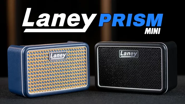 Two Laney Prism Mini portable amplifiers sit side by side on a dark surface, blue woven grille and black mesh with Laney logos visible. ขายราคาพิเศษ
