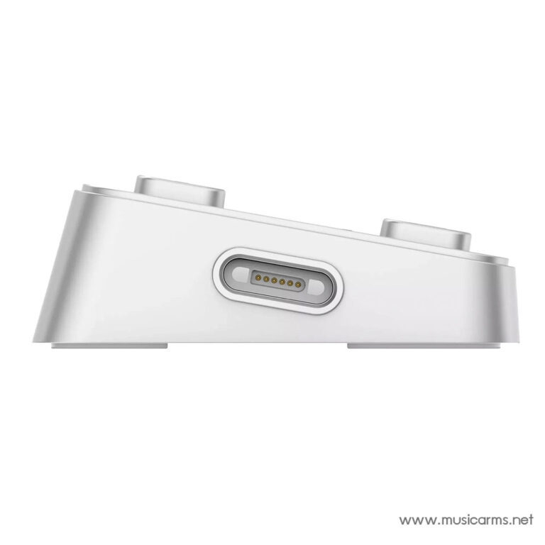 Close-up of a white device showing an oval multi‑pin connector on its side, recessed in a gray housing. ขายราคาพิเศษ