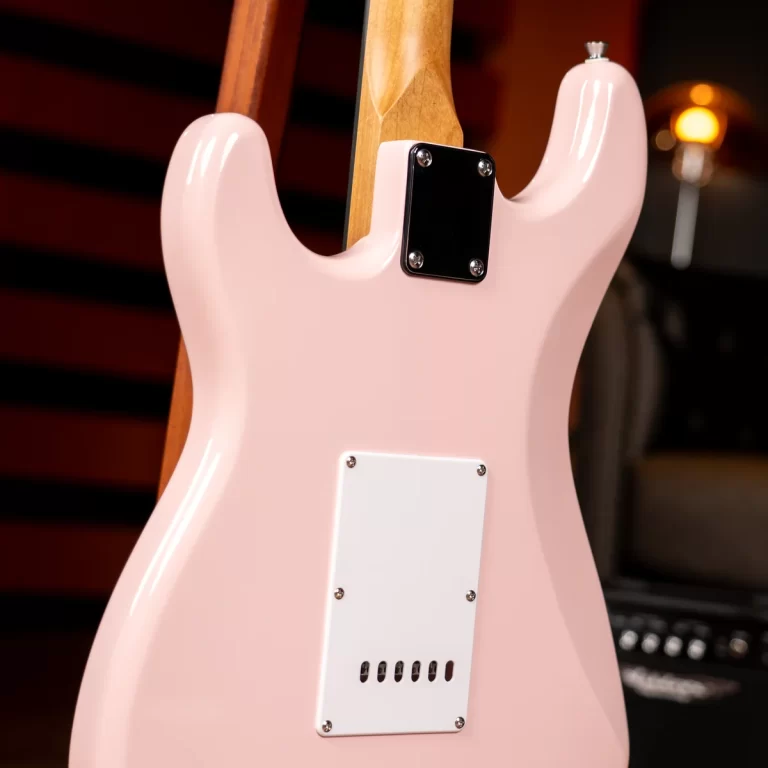 Back view of a pastel pink electric guitar showing the neck joint and rear control plate with screws. ขายราคาพิเศษ