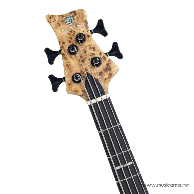 Burl-wood bass guitar headstock with four tuning pegs and strings, Marcus Miller Fretless logo visible on the headstock. ขายราคาพิเศษ