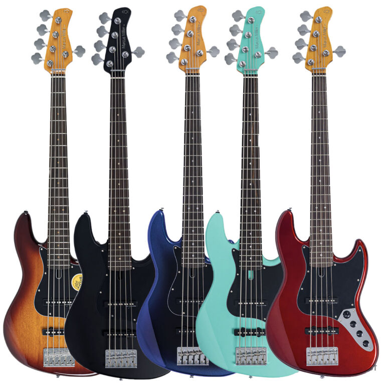 Five electric bass guitars in a row: sunburst, black, blue, turquoise, and red finishes on a white background. ขายราคาพิเศษ
