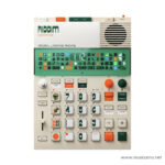 Retro music production drum machine with beige body, green display panel, and grid of colorful pads labeled RIDDIM Supertone Original Layering Machine ลดราคาพิเศษ