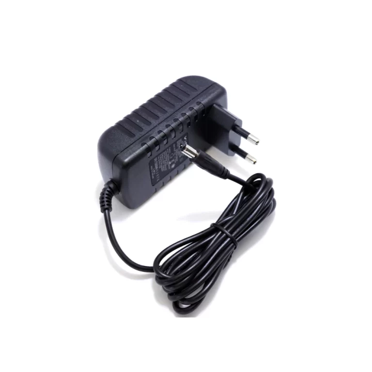 AC power adapter with coiled cord and plug, used to convert mains to DC for electronics ขายราคาพิเศษ
