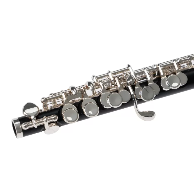 Close-up of a black flute with shiny silver keys and pads visible along the body. ขายราคาพิเศษ