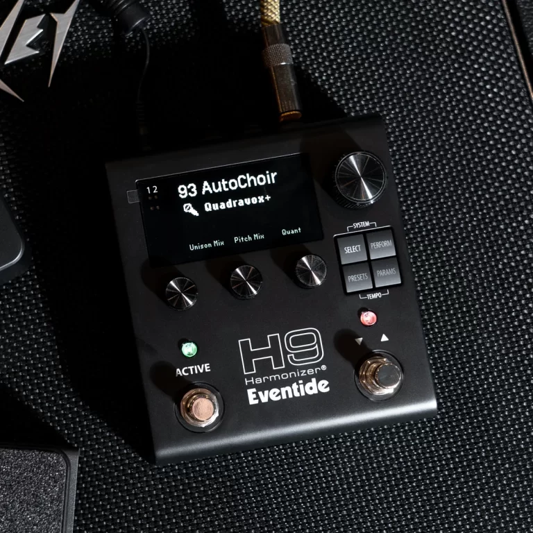 Eventide H9 Harmonizer pedal with a display reading '93 AutoChoir QuadraVox+' and multiple control knobs and footswitches on a dark textured surface. ขายราคาพิเศษ