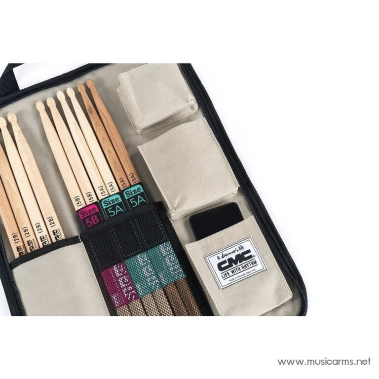 Open beige drumstick case with neatly organized wooden sticks labeled 5A and 5B, plus fabric pockets and pouches inside. ขายราคาพิเศษ