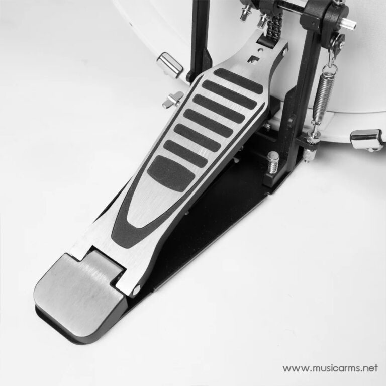 Close-up of a metal drum pedal with a textured footboard and coiled spring mechanism mounted to a bass drum. ขายราคาพิเศษ
