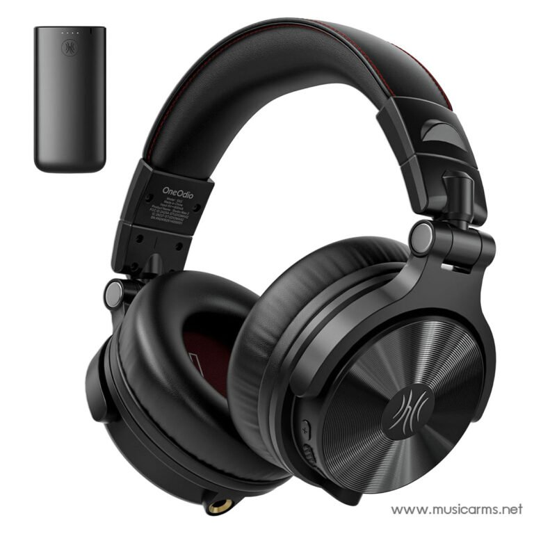 Black over-ear headphones with red stitching and brushed metal cups, shown at an angle with a small black charging accessory to the left. ขายราคาพิเศษ