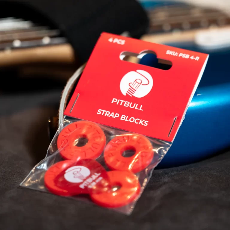 Red Pitbull Strap Blocks package with four orange circular strap washers visible through plastic, SKU PSB 4-R written on top. ขายราคาพิเศษ