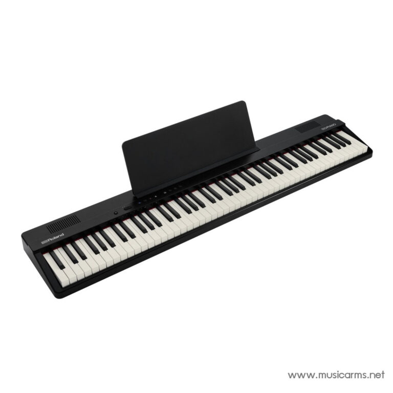 Roland digital piano with 88 keys and a black music stand, angled view from above ขายราคาพิเศษ