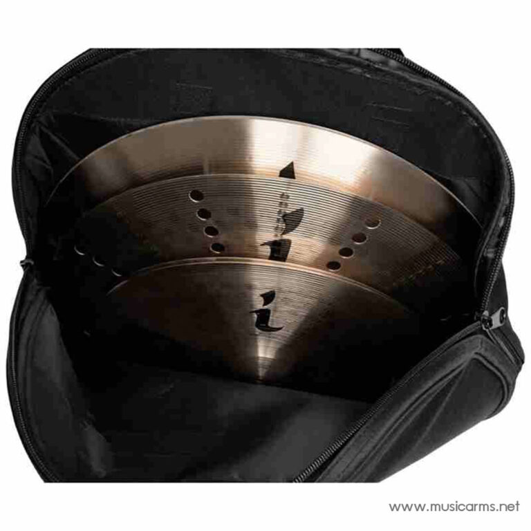 Open bag shows a copper-toned circular resonator cone with holes inside a black guitar case; part of a musical instrument component. ขายราคาพิเศษ