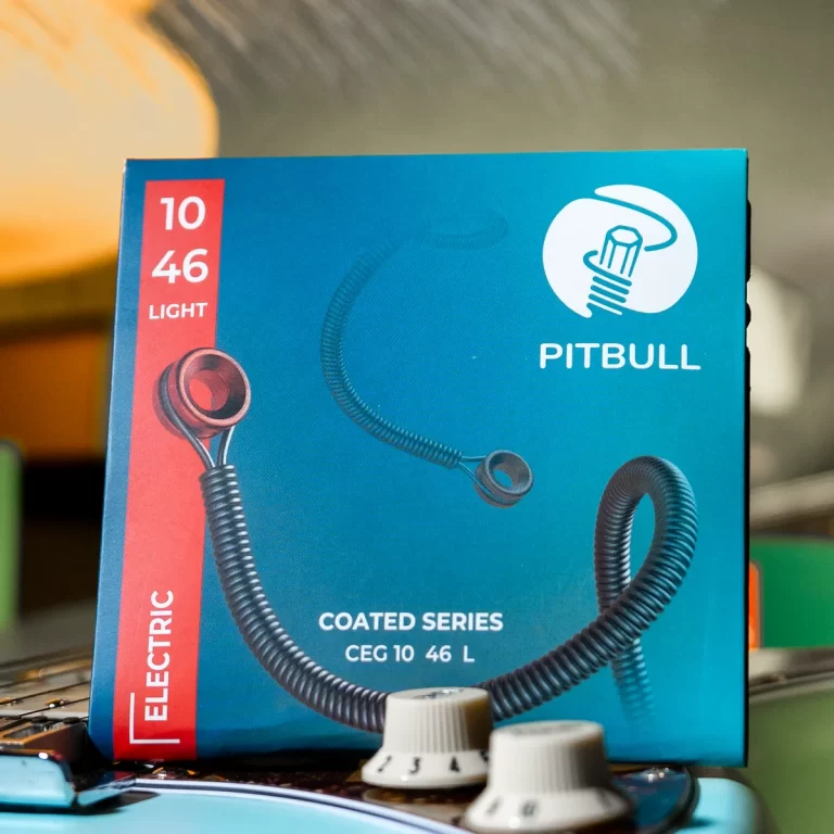 Blue Pitbull electric light product box with a coiled neck cord and red '10 46 LIGHT' label on the left; features the Pitbull logo and 'COATED SERIES' text. ขายราคาพิเศษ