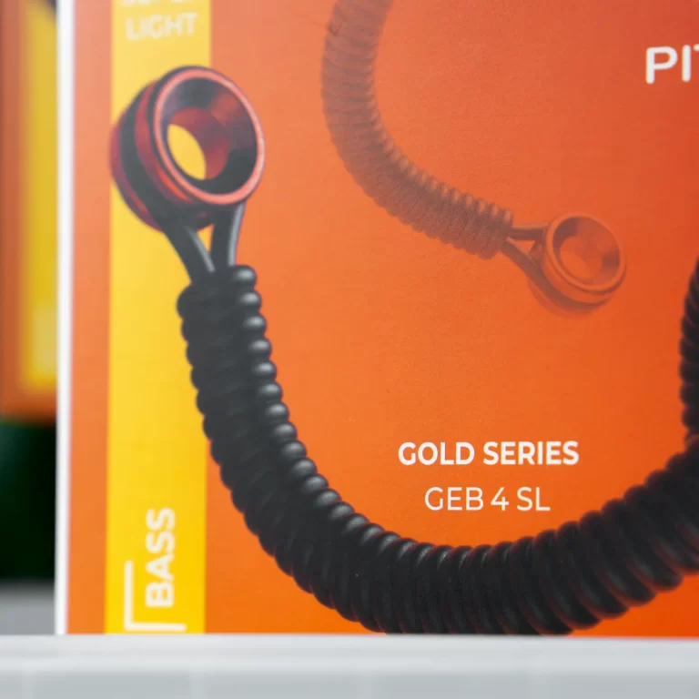 Bright orange packaging for a Gold Series product labeled GEB 4 SL with a black coiled cord visible in the foreground and the word BASS on a yellow strip to the left. ขายราคาพิเศษ