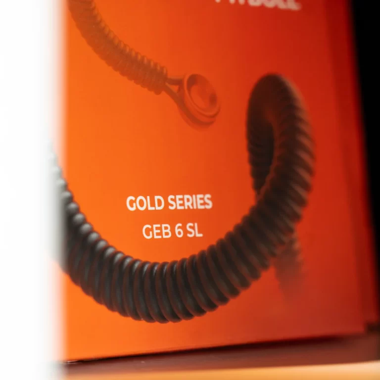 Close-up of an orange product box with a black coiled cord and the text 'GOLD SERIES GEB 6 SL'. ขายราคาพิเศษ