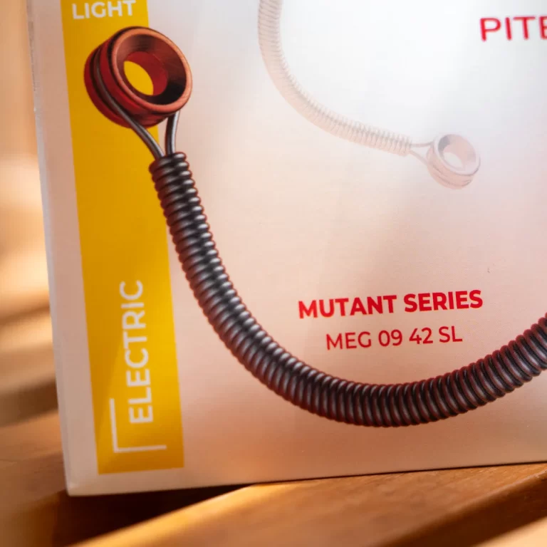 Close-up of a product box featuring a coiled black cord and the text 'MUTANT SERIES' and 'MEG 09 42 SL' on a white background with a yellow ELECTRIC label on the side. ขายราคาพิเศษ