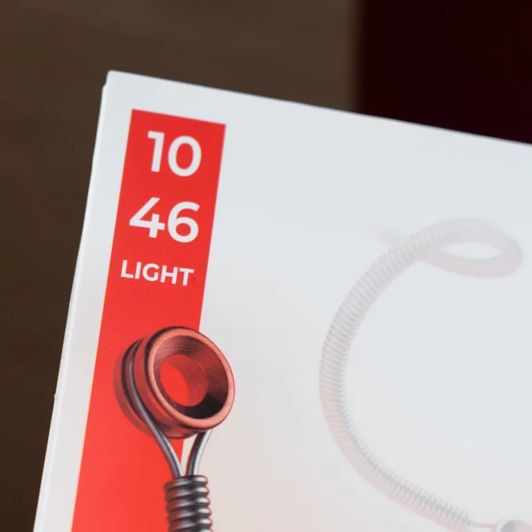 Product packaging with a red vertical label reading '10 46' and 'LIGHT', with a stethoscope illustrating at the bottom left. ขายราคาพิเศษ