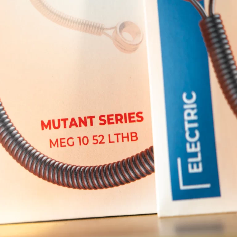 Product packaging labeled MUTANT SERIES MEG 10 52 LTHB with a black coiled cable nearby. ขายราคาพิเศษ