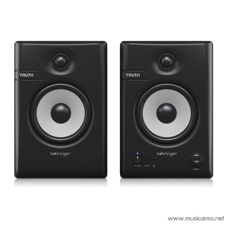 Pair of black Behringer studio monitor speakers facing forward, with one showing controls and a power switch on the front. ขายราคาพิเศษ