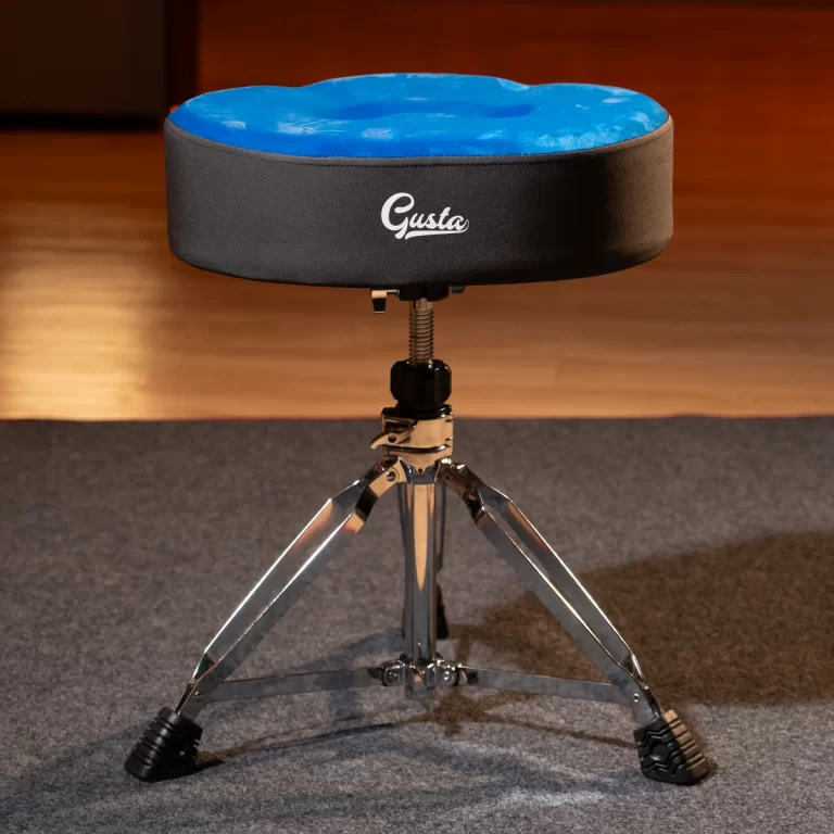 Round drum throne with a blue padded top and a chrome, adjustable tripod base in a studio setting ขายราคาพิเศษ