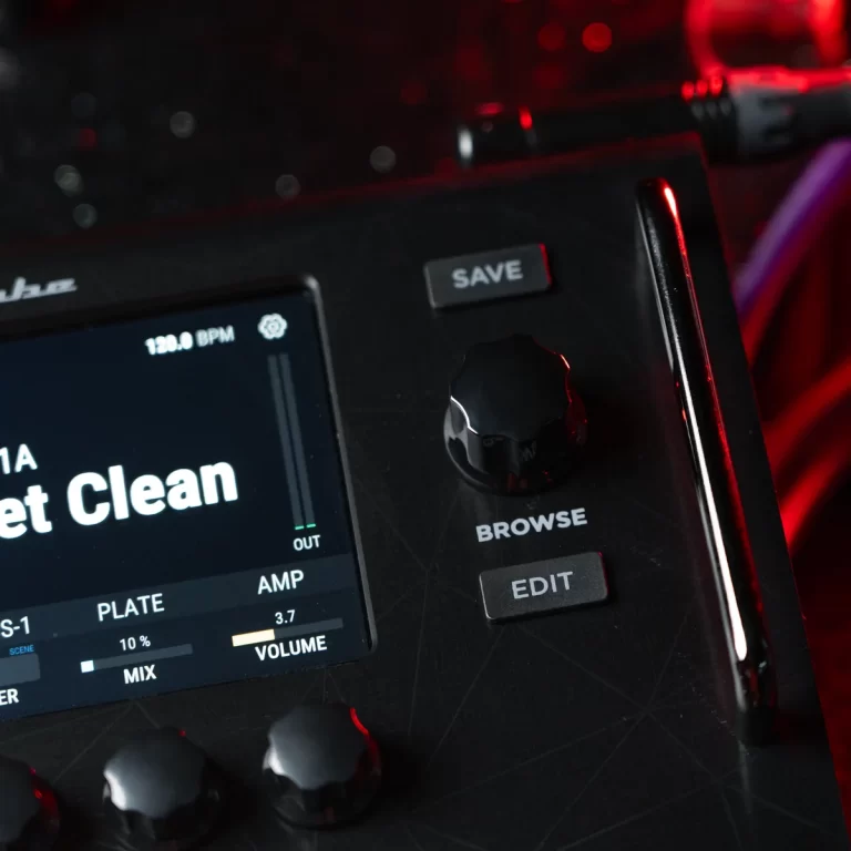 Close-up of a guitar effects processor panel with a large black rotary knob, a SAVE button, BROWSE and EDIT labels, and a display showing settings and meters. ขายราคาพิเศษ