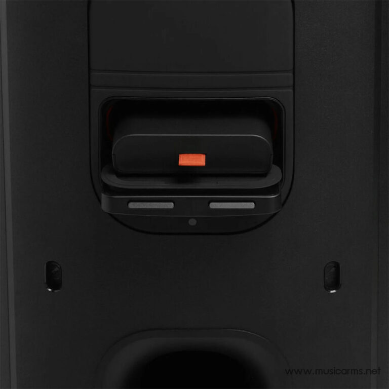 Close-up of a black firearm safety lever with an orange tab in a dark case. ขายราคาพิเศษ