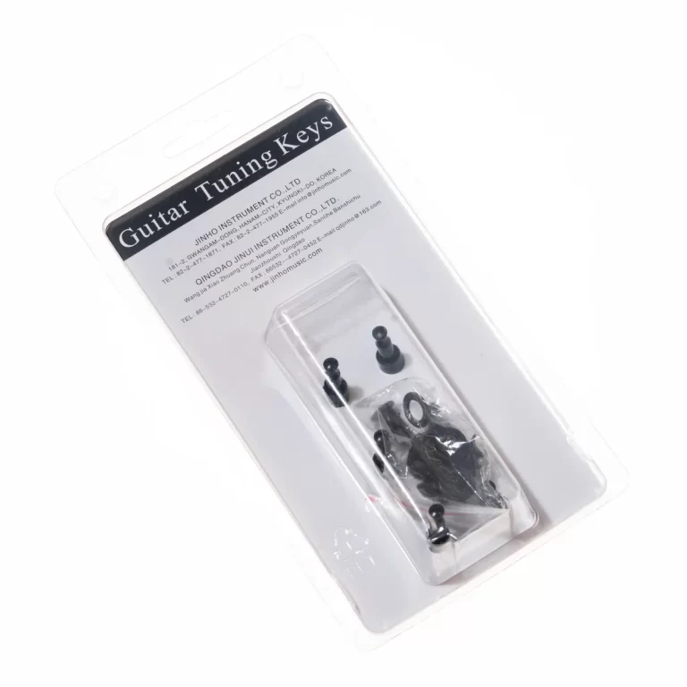 Guitar tuning keys in a plastic blister pack labeled 'Guitar Tuning Keys' on a white backing card, ready for sale ขายราคาพิเศษ