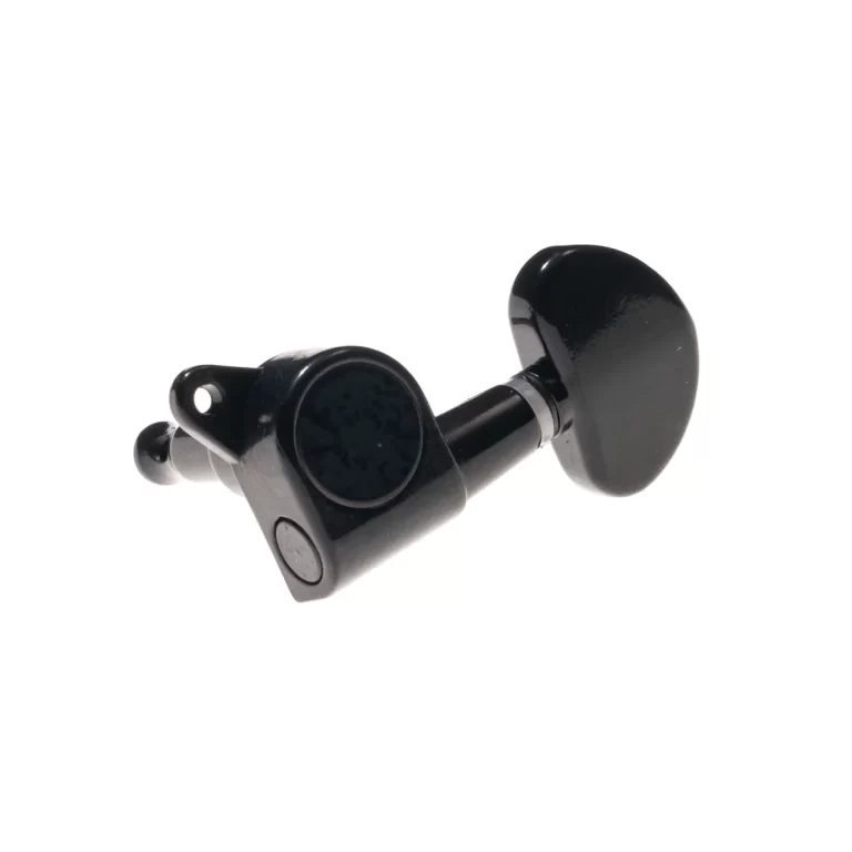 Close-up of a black guitar tuning peg (machine head) with a rounded knob on a light background. ขายราคาพิเศษ