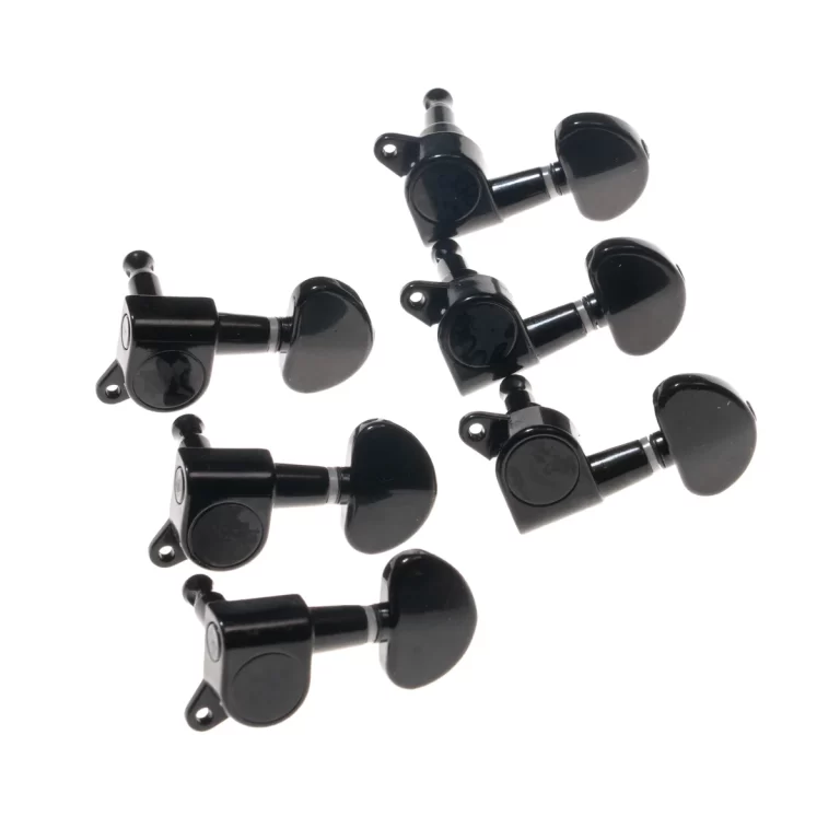 Six black guitar tuning pegs on a white background. ขายราคาพิเศษ