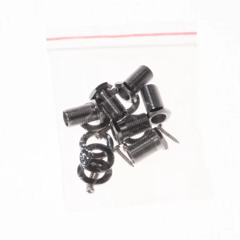 Assorted black metal bolts, screws, and washers in a clear resealable plastic bag. ขายราคาพิเศษ