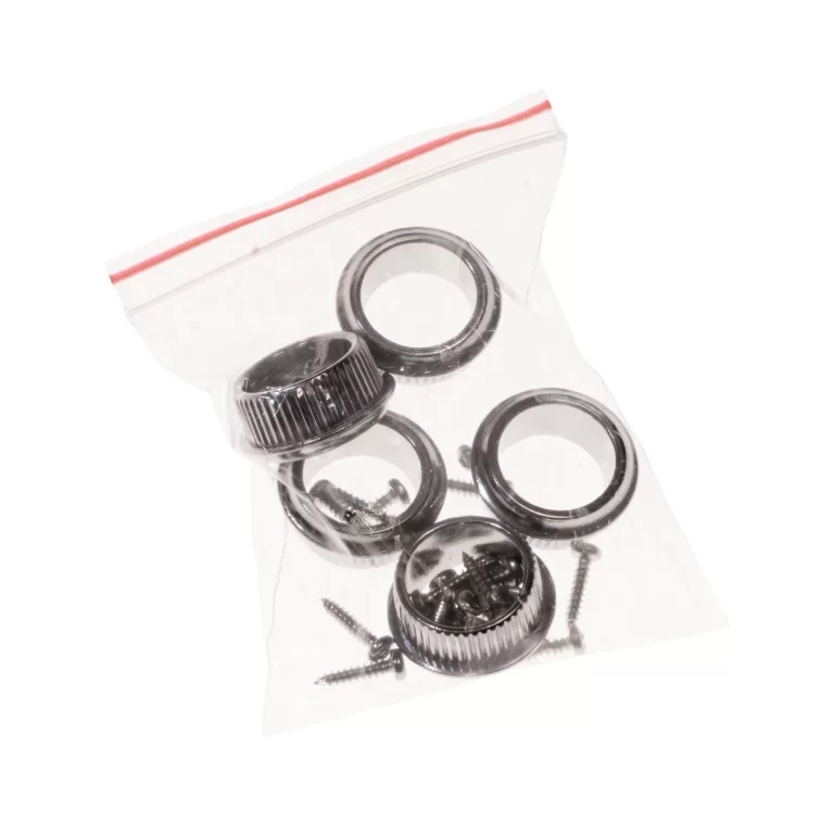 Assorted metal rings, screws, and small hardware in a resealable plastic bag. ขายราคาพิเศษ