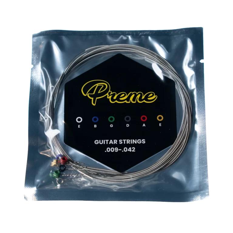 Sealed metallic blue packaging for guitar strings; coiled strings visible and color-coded ball ends; reads 'GUITAR STRINGS .009-.042' on the label. ขายราคาพิเศษ