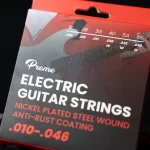 Box label for Prime electric guitar strings, nickel‑plated steel with anti‑rust coating, gauges .010–.046 ขายราคาพิเศษ