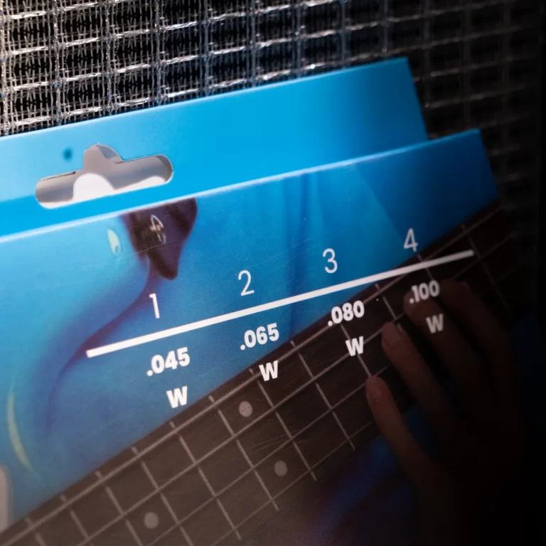 Blue packaging showing a wire gauge chart with numbers 1–4 and sizes like .045, .065, .080 labeled 'W'. ขายราคาพิเศษ