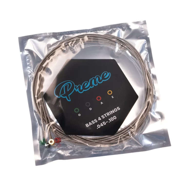 Pack of four bass strings in a sealed plastic bag with a black hexagonal label reading 'Bass 4 Strings .045-.100'. ขายราคาพิเศษ