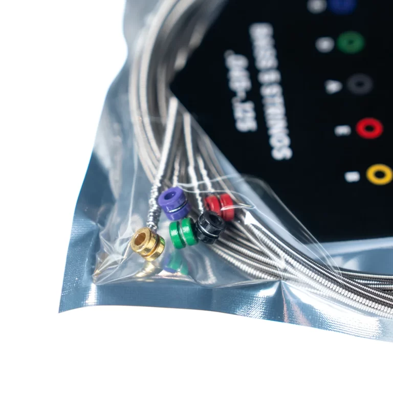 Colored medical connector caps and coiled stainless steel tubing in a sealed plastic bag. ขายราคาพิเศษ