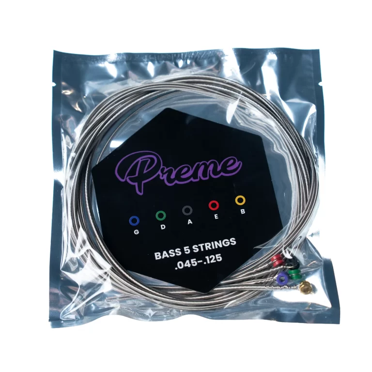 Packaged bass guitar strings for a 5-string bass (.045–.125) with color-coded ball-end ferrules in a sealed bag, brand 'Preme' visible on the label ขายราคาพิเศษ