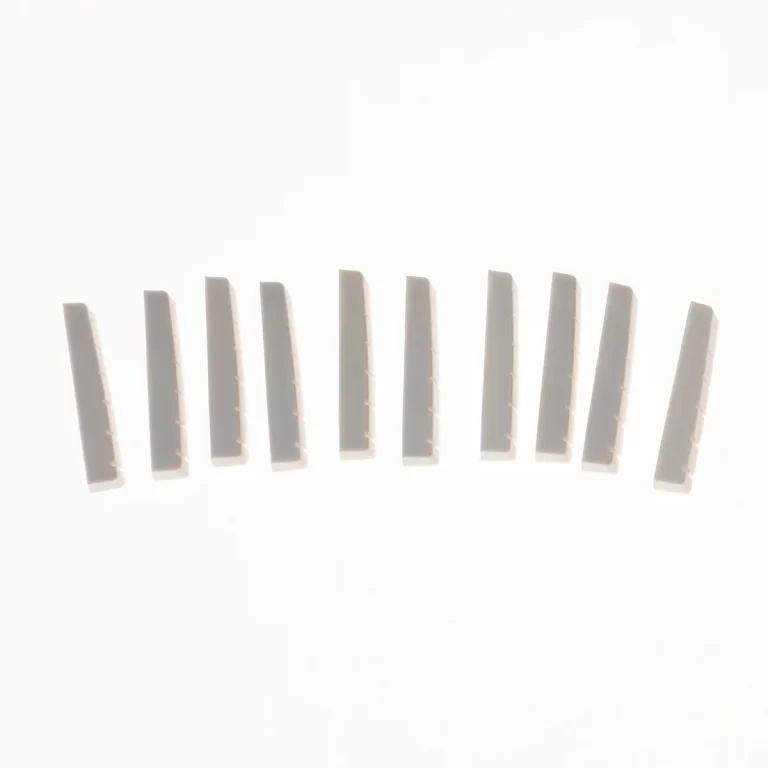 Row of small gray rectangular bars with notches along one edge, arranged in a gentle arc on a white background ขายราคาพิเศษ