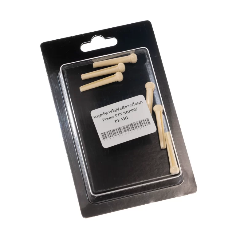Beige plastic pins in a clear blister pack on a black display card with a barcode label stuck to the front of the packaging. ขายราคาพิเศษ