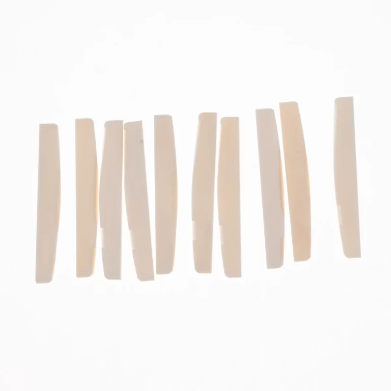 Row of slender off-white rectangular bars standing upright on a white background. ขายราคาพิเศษ