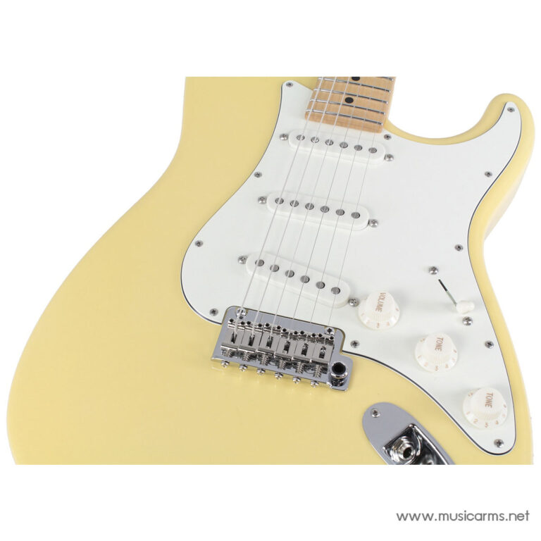 Yellow electric guitar (Strat-style) with a white pickguard, three single-coil pickups, and chrome bridge visible up close ขายราคาพิเศษ
