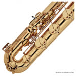 Polished gold saxophone with intricate keys photographed at an angled diagonal. ขายราคาพิเศษ