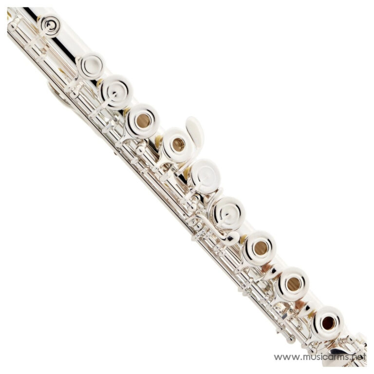 Close-up of a silver flute diagonally across the frame, showing keys and tone holes. ขายราคาพิเศษ