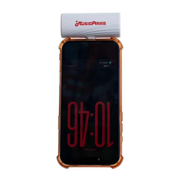 Phone in an orange protective case with a white MusicArms accessory resting on top of the device. ขายราคาพิเศษ