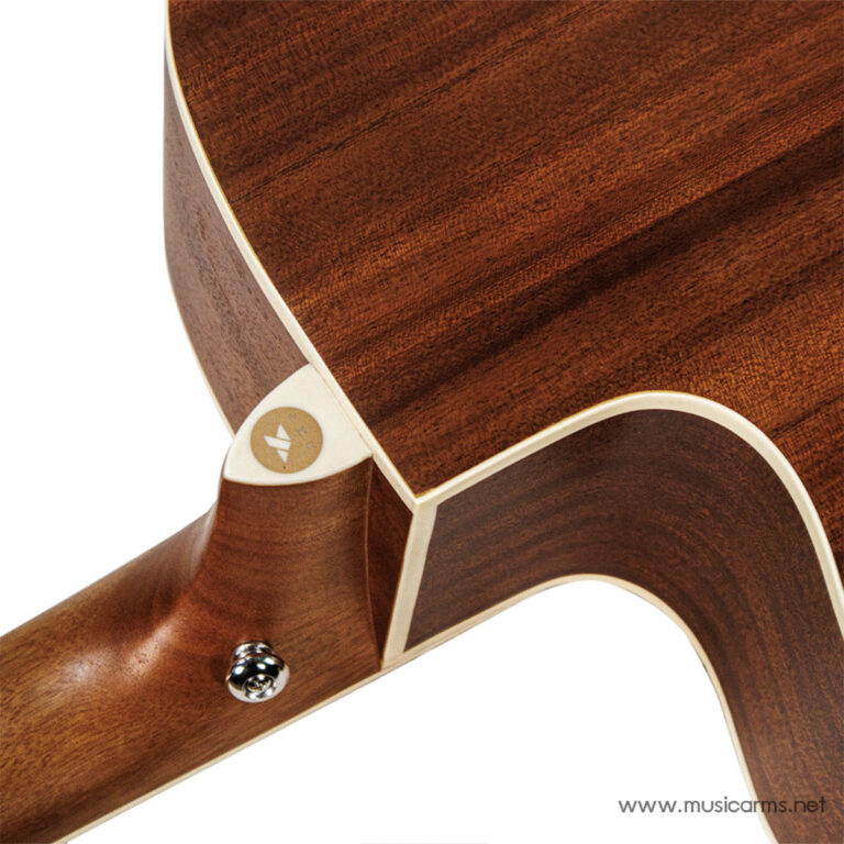 Close-up of a brown acoustic guitar where the neck meets the body, showing cream binding and a small logo plate on the heel. ขายราคาพิเศษ