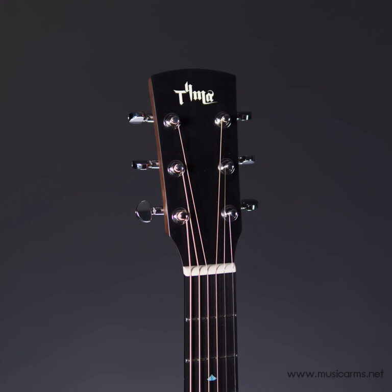 Close-up of a dark guitar headstock with six chrome tuning pegs and strings, featuring a 'Tima' logo against a dark background, watermark www.musicarms.net visible. ขายราคาพิเศษ